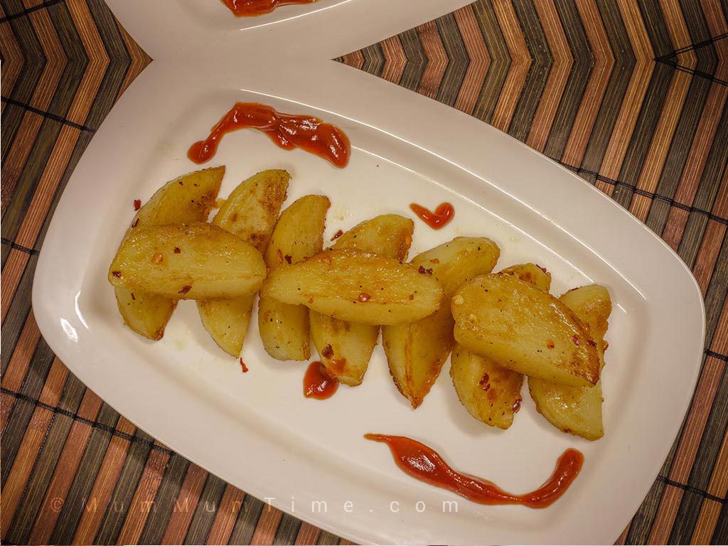Honey-glazed potato wedges recipe